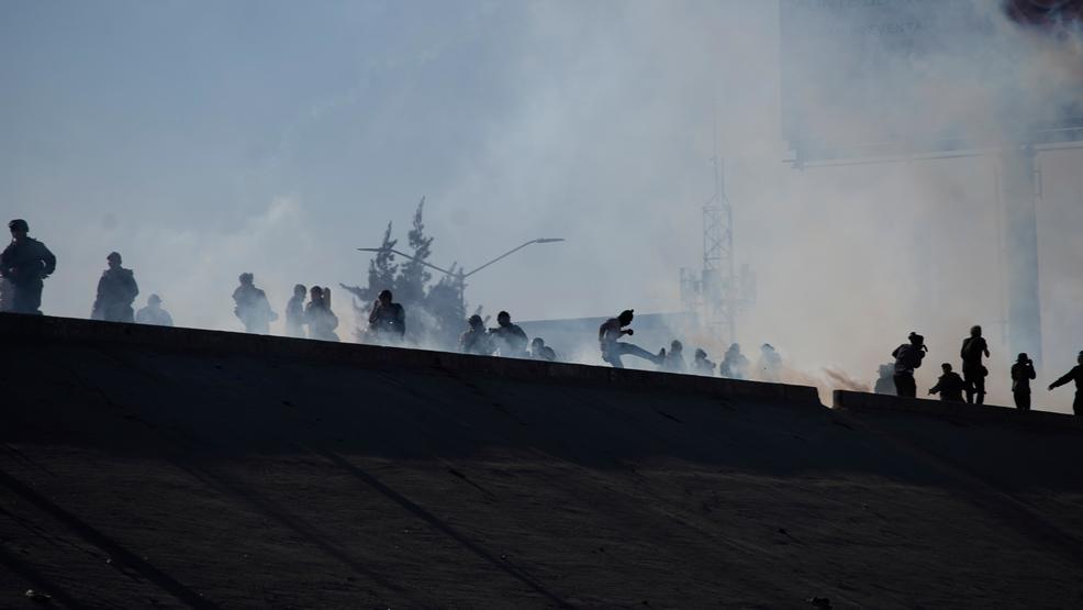 Central America Migrant Caravan Caravan tiajuana border clash tear gas AP149.jpg