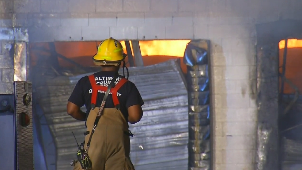 Fire still burning 24 hours later at Adell Plastics; demolition crews