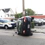 Car rolls over on man in Providence