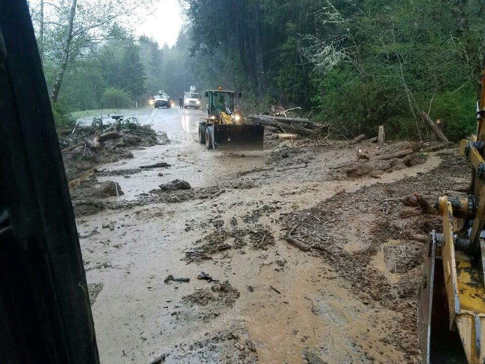 multiple slides caused by heavy rainfall have kept road crews